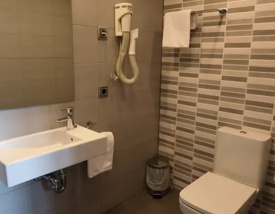 Suite Àtic amb terrassa privada davant del mar